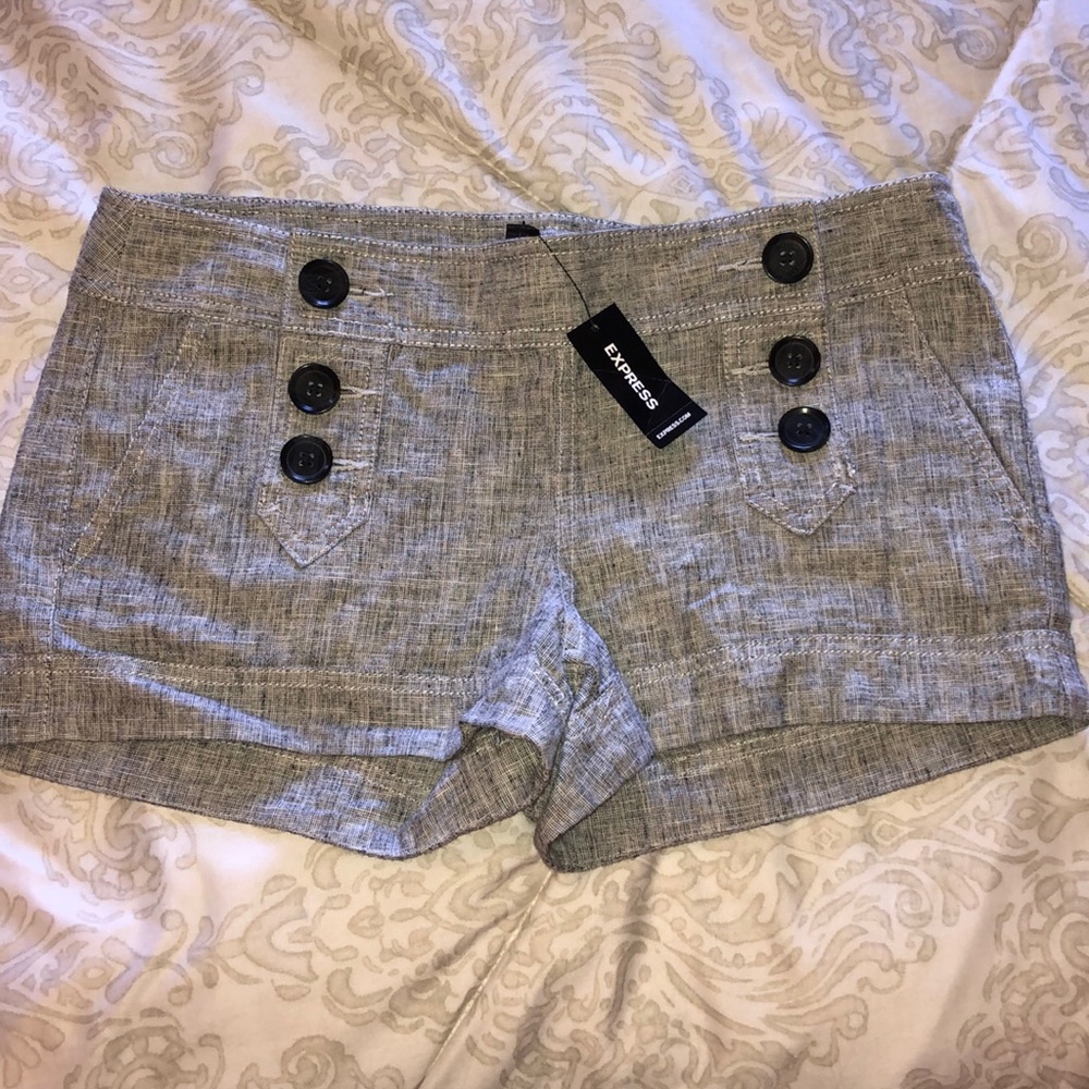 Brand new! Button up material shorts